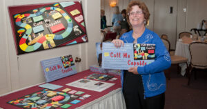 Carol Leish with her board game